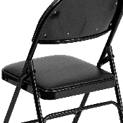 HERCULES Series Ultra-Premium Triple Braced Black Vinyl Metal Folding Chair with Easy-Carry Handle, HA-MC705AV-3-BK-GG