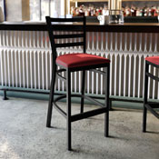 HERCULES Black Ladder Back Metal Restaurant Barstool - Red Vinyl Seat